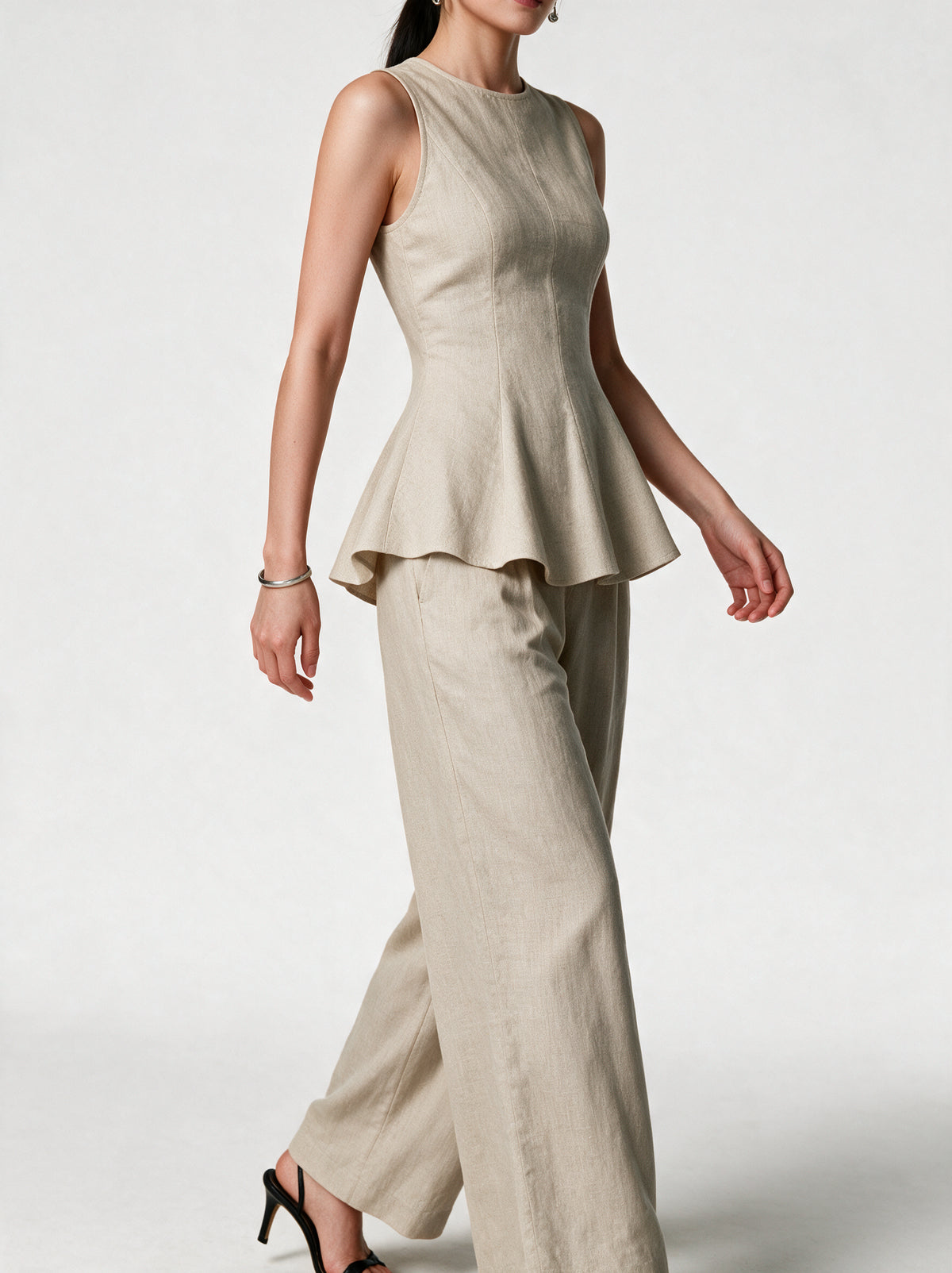 Valeria Linen Peplum Top - Warm Oat — model side detail