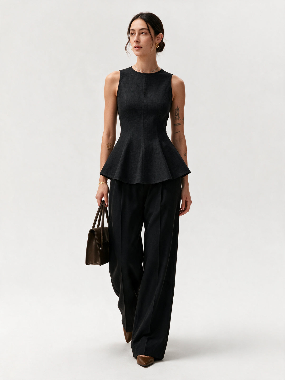Valeria Linen Peplum Top - Black — model side detail