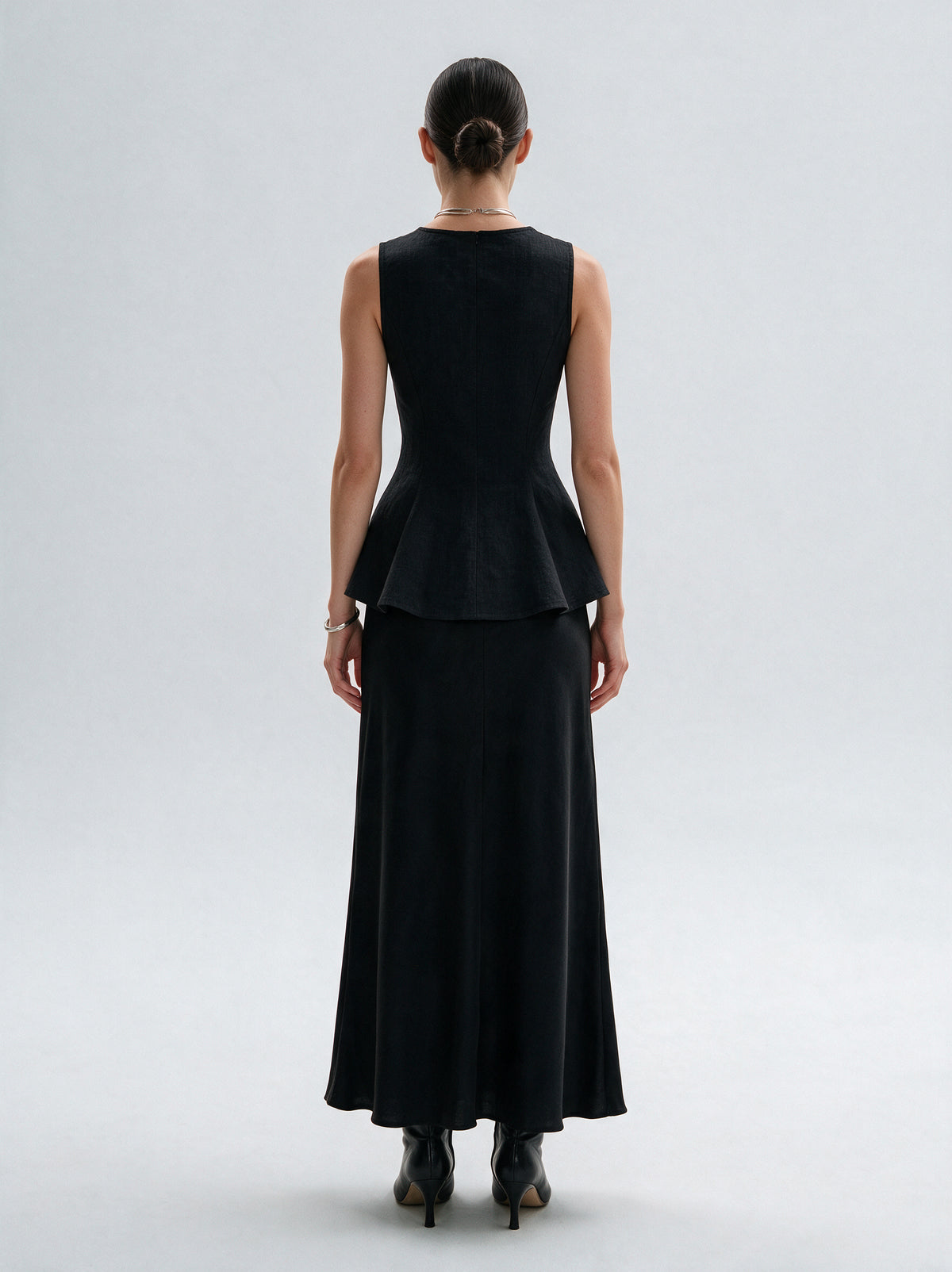 Valeria Linen Peplum Top - Black — model back view