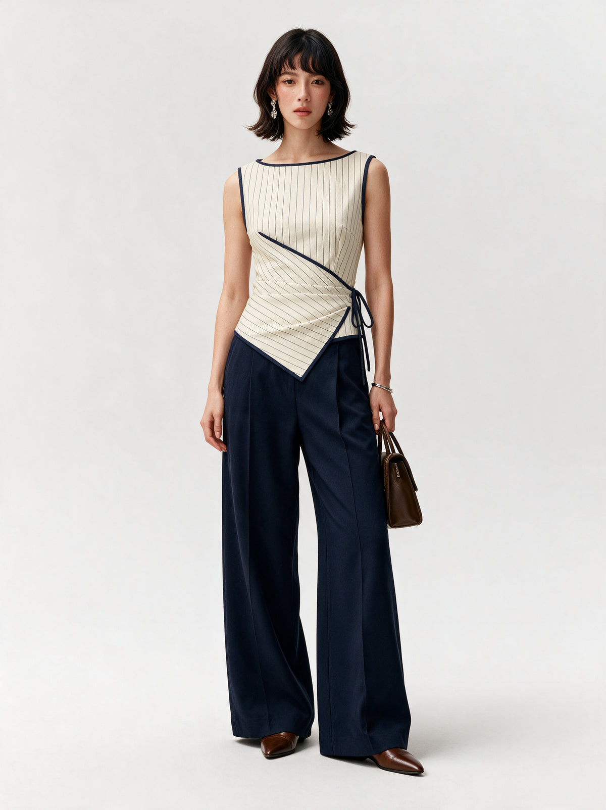 Valeria Pinstripe Asymmetric Wrap Top - Ivory Pinstripe — model full body