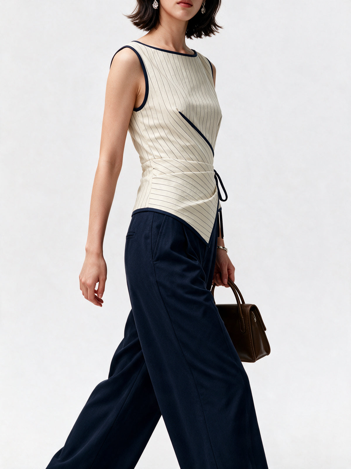 Valeria Pinstripe Asymmetric Wrap Top - Ivory Pinstripe — model side detail