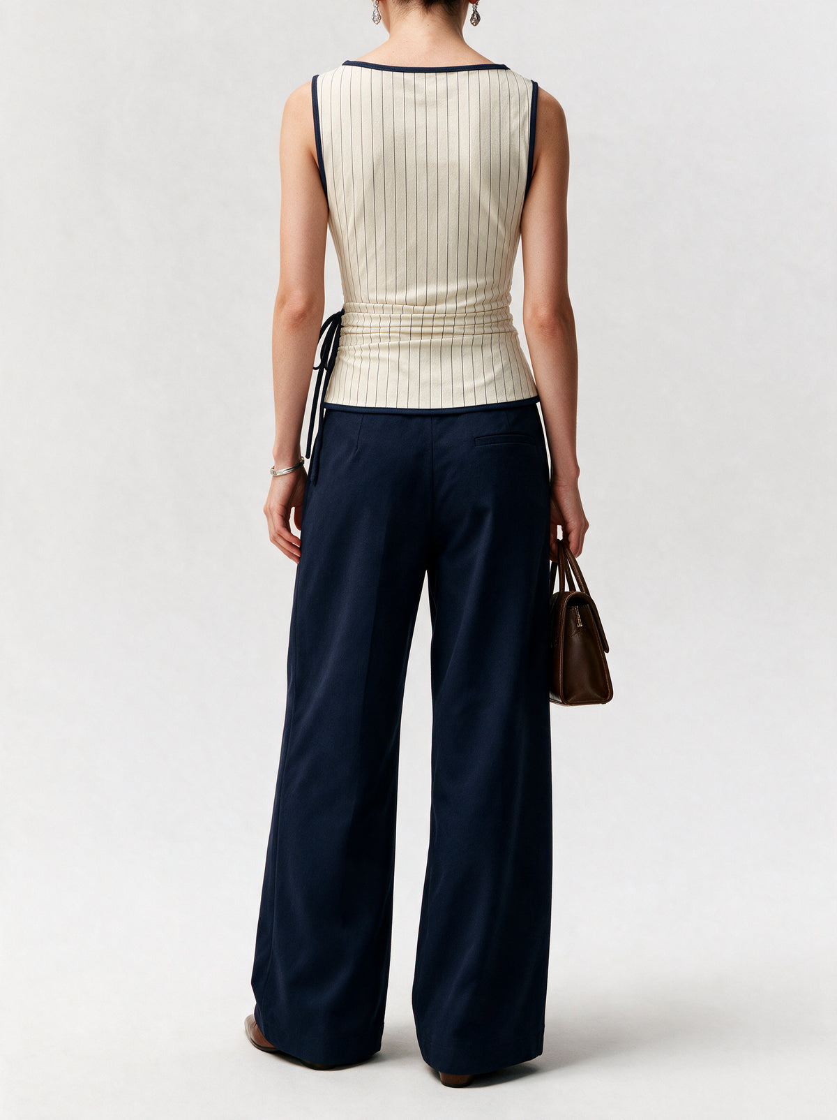 Valeria Pinstripe Asymmetric Wrap Top - Ivory Pinstripe — model back view