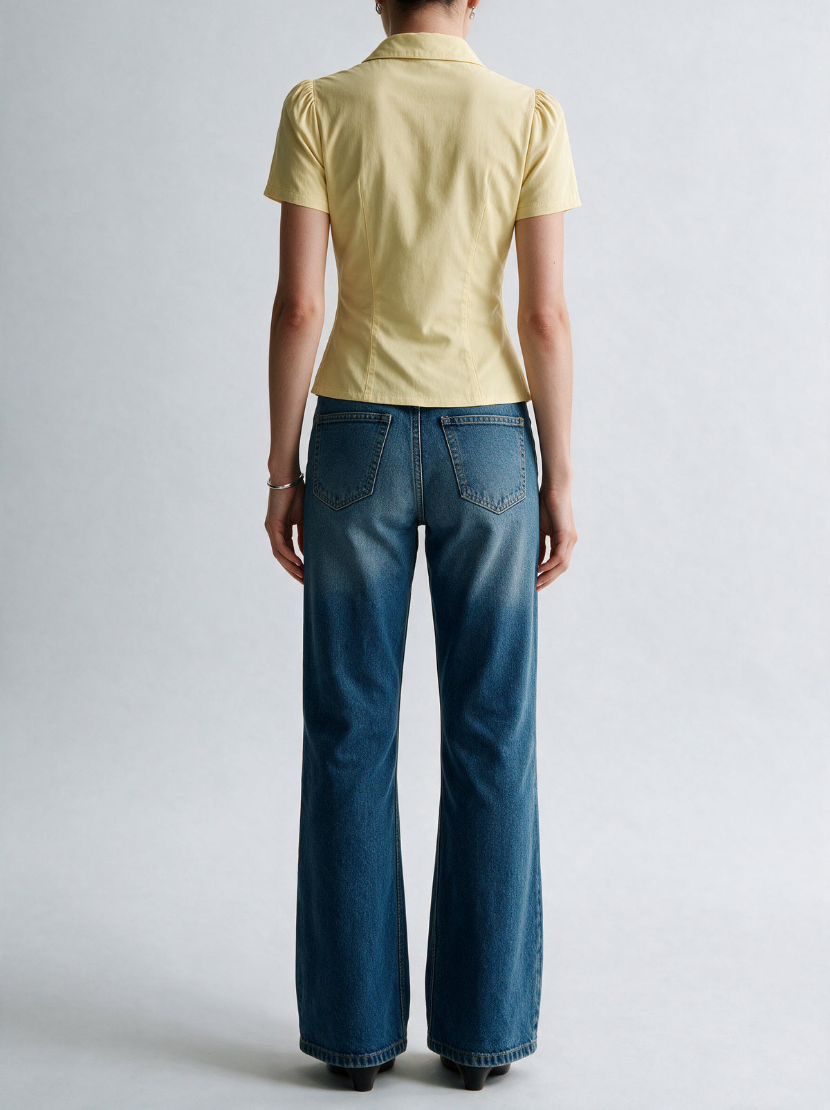 Valeria Pleated Plunge Shirt - Butter Yellow — model back view