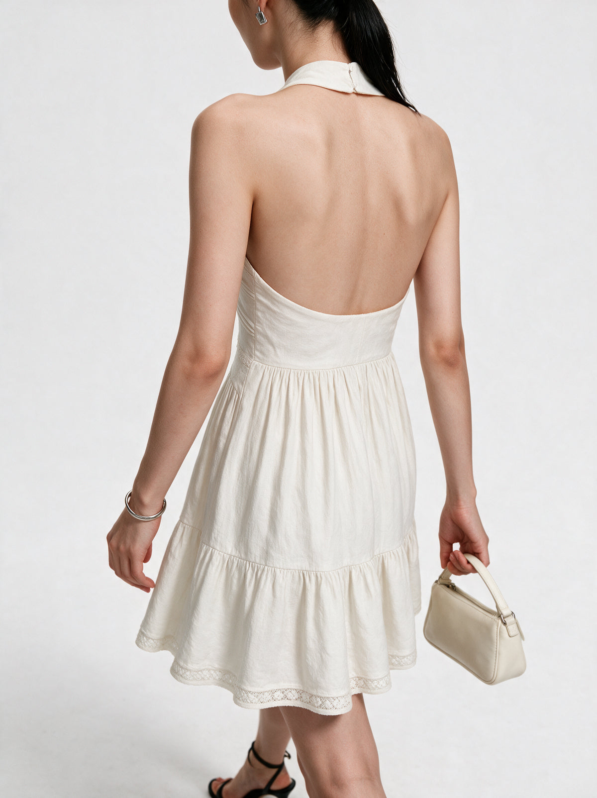Valeria Twisted Halter Mini Dress - Off White — model side detail